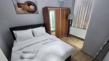 Family Apartment | Premium bedding, down comforters, desk, soundproofing