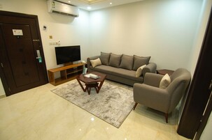 Comfort Apartment, 2 Bedrooms | Living area | Flat-screen TV