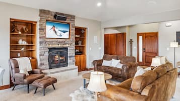 House, Multiple Beds, Hot Tub, Mountain View (Granby Escapes) | Living area | 42-inch flat-screen TV with digital channels, fireplace