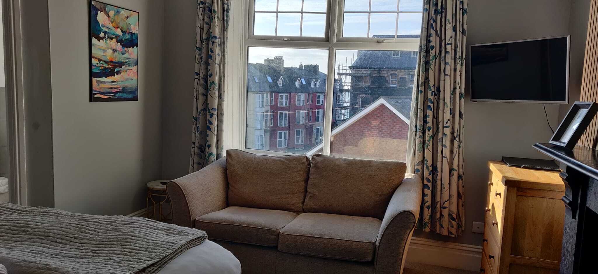 Superior Double Room, 1 King Bed, Private Bathroom, Partial Sea View | Street view