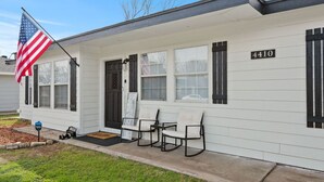 A single-story house with a number 4410 on the front. - All American Cottage (Wichita Falls)