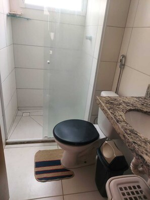 Shower, towels, soap, toilet paper