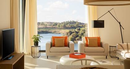 Escape to luxury in the Monte Rei 3-Bedroom Penthouse Apartment with a communal heated pool and stunning views