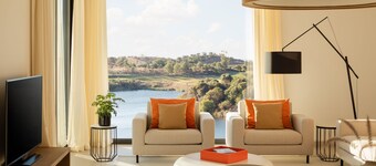 Heated pool, lush gardens, and air conditioning at Monte Rei.