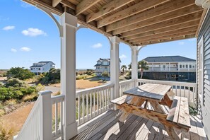 Outdoor dining - "Our Little SEAcret" 5 Bedroom 3.5 Bathroom Home with a Pool! (Holden Beach)