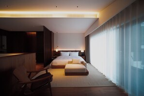 Premium bedding, down comforters, memory foam beds, free minibar - WishGarden Resorts (Huangshan)