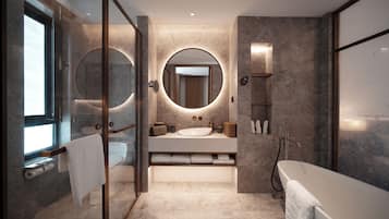 Combined shower/bathtub, free toiletries, hair dryer, bathrobes