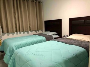 2 habitaciones, tabla de planchar con plancha, wifi y ropa de cama 