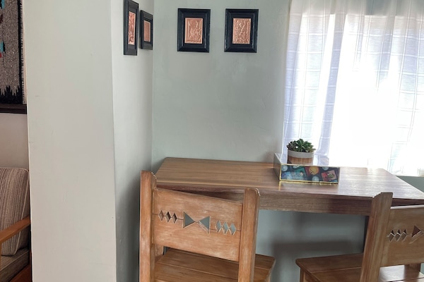 Dining room or space to play a board game.