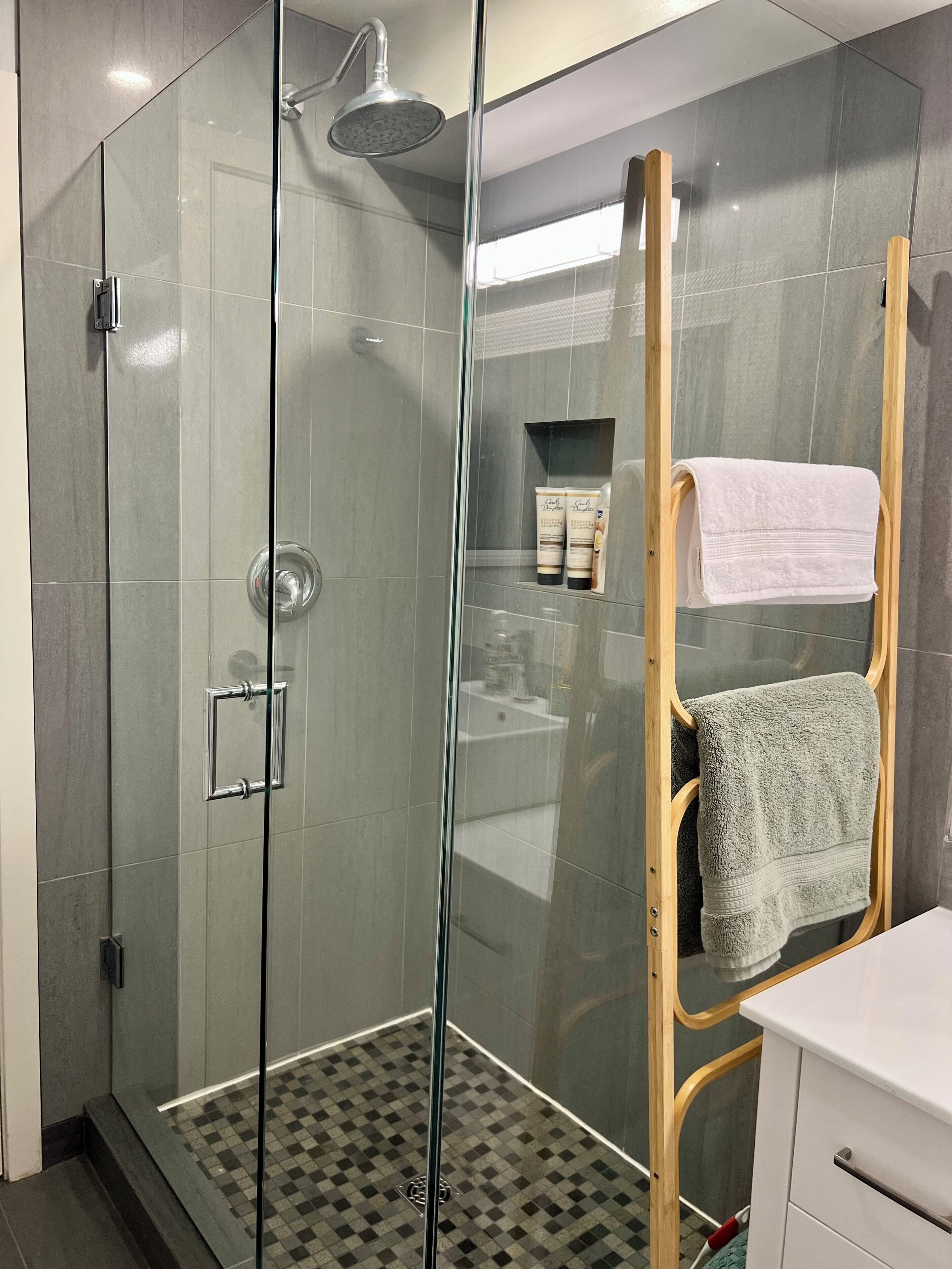 Shower, hair dryer, towels, soap