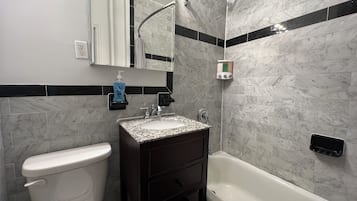 Hair dryer, towels, soap, shampoo