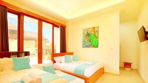 A hotel room with two beds, a large window, and a painting on the wall. - Luxury Villa Noam 2BR Nusa Dua (Nusa Dua)