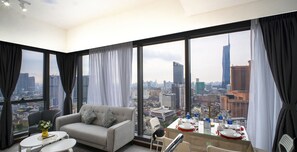 Family two bedroom apartment (KL Towers View) | Living area | 43-inch Smart TV with digital channels, Netflix, pay movies
