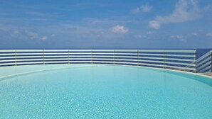 A clear blue sky and a pool with a white railing. - CASA LUISA A CAPO'DARCO - CASA LUISA (Rio Marina)