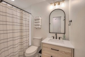 Dutxa, assecador de cabells i tovalloles 