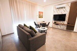 Superior Suite, 1 Bedroom, City View | Living area