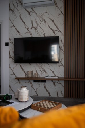 Superior Suite, 1 Bedroom, City View | Living area