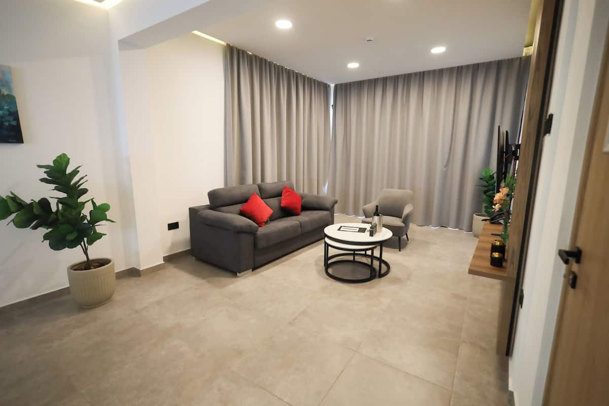 Executive suite, uitzicht op de stad | Woonruimte