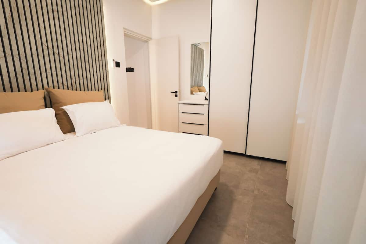 Superior suite, 1 slaapkamer, uitzicht op de stad | 1 slaapkamer, een kluis op de kamer, verduisterende gordijnen