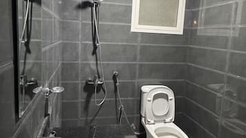 Shower, slippers, towels, soap