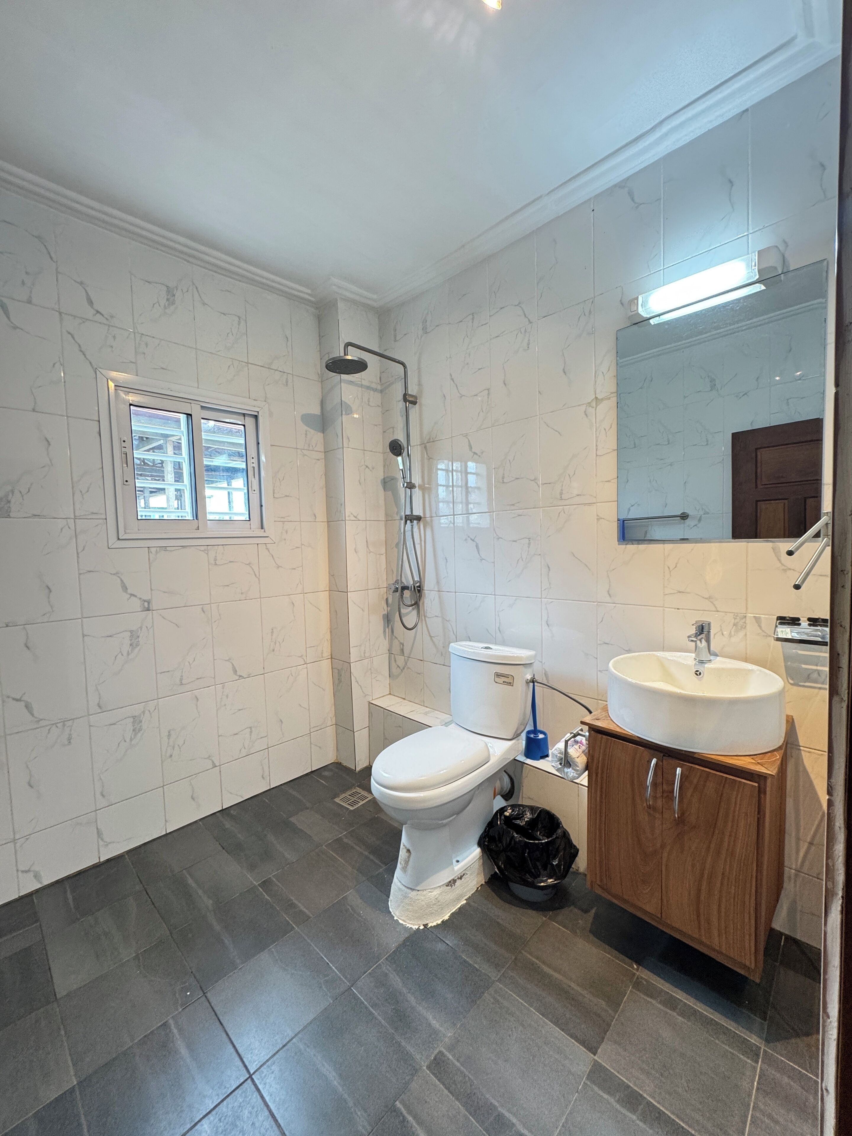 Shower, free toiletries, slippers, towels