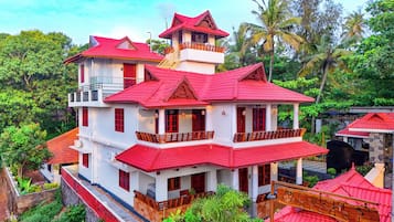 On the beach, black sand, beach umbrellas