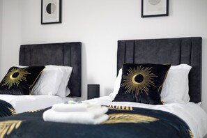 4 habitaciones, escritorio, tabla de planchar con plancha y wifi gratis 