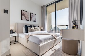 1 chambre, coffre-fort, fer et planche à repasser