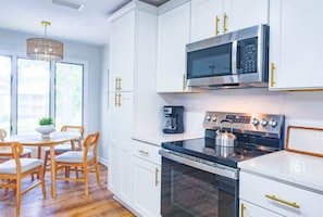 Fridge, microwave, dishwasher, coffee/tea maker