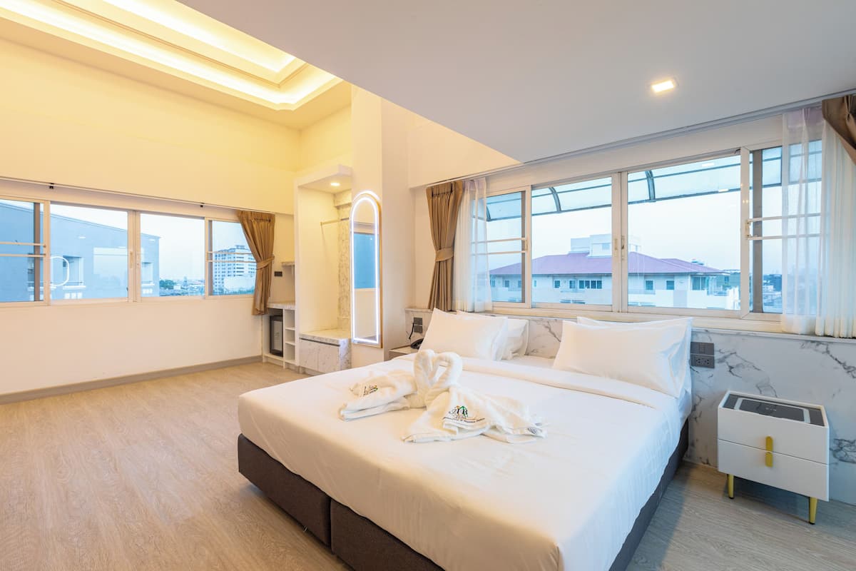 Family Suite Double and Double | 1 slaapkamer, een minibar met enkele gratis items, gratis wifi
