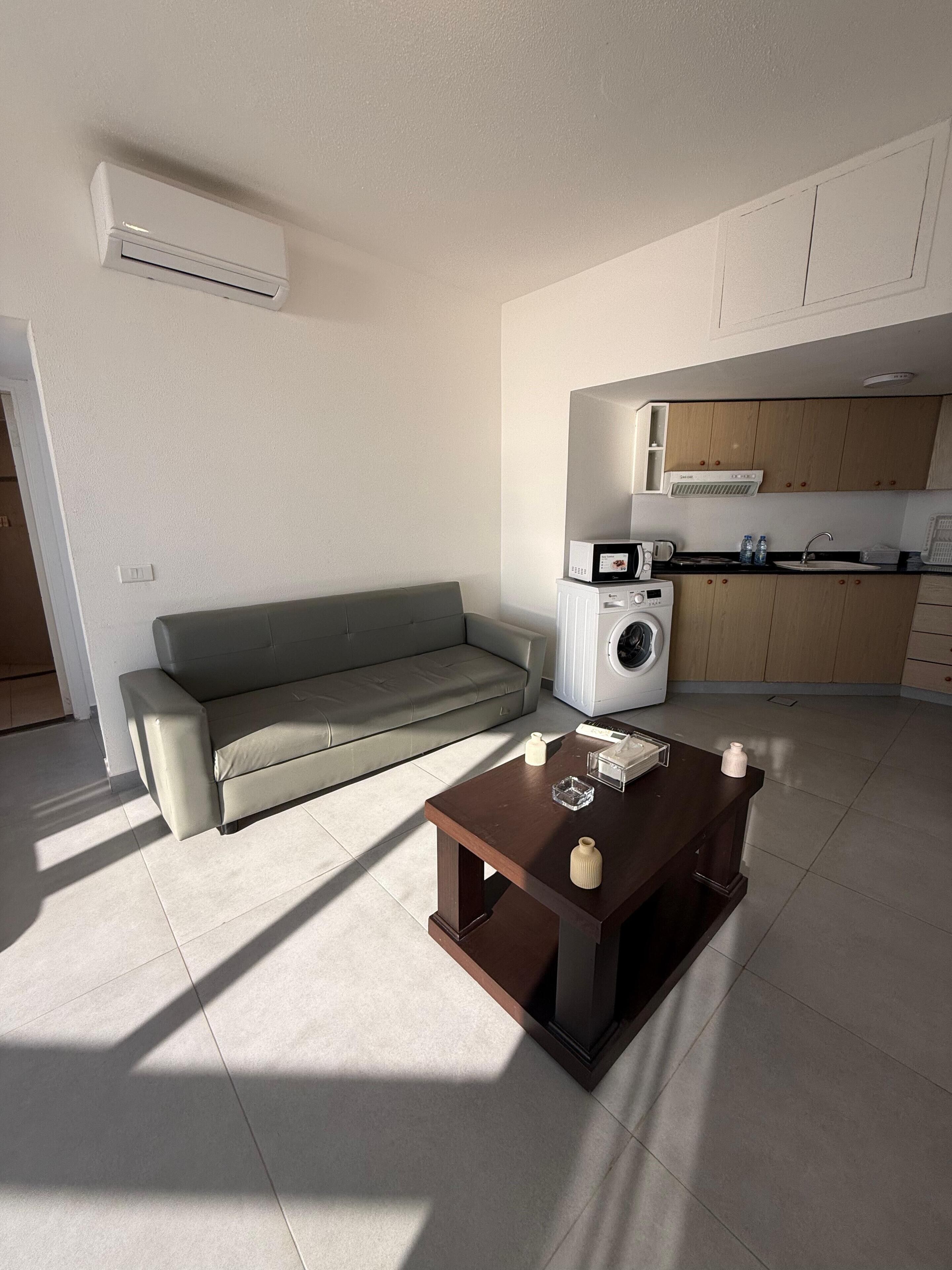 Family Suite, Balcony, Sea View | Living area | TV