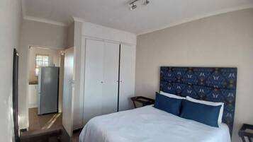 Apartamento, 1 quarto, sacada, vista para o jardim | 1 quarto