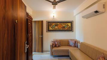 Family Double Room, City View | In-room safe, desk, laptop workspace, iron/ironing board