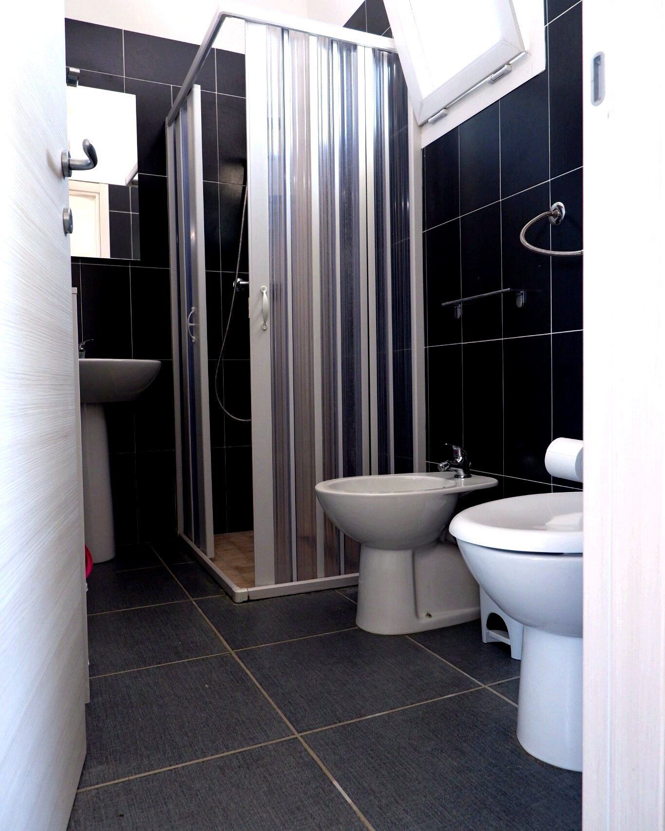 Deluxe Bungalow, Air conditioning, Beach View | Bathroom | Shower, toilet paper