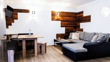 Appartement Familial, balcon, vue jardin | Coin séjour