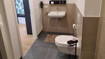 Hair dryer, towels, soap, toilet paper