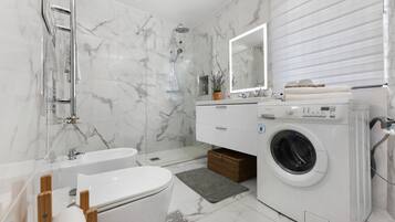Shower, hair dryer, towels