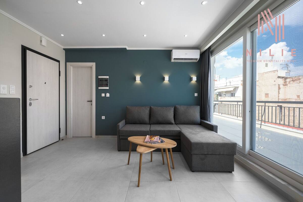 Apartment, 1 Bedroom, Balcony, City View | Living area | Flat-screen TV