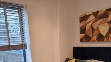2 habitaciones, tabla de planchar con plancha, wifi y ropa de cama