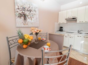 Studio (Classic Studio Apartment with Sea Vie) | Private kitchen | Fridge