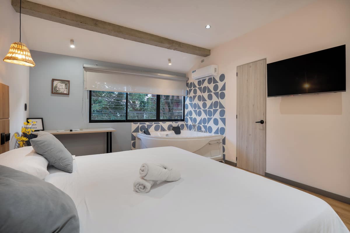 Deluxe Room, Kitchenette | In-room safe, free WiFi