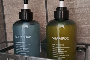 Shower, hair dryer, towels, soap