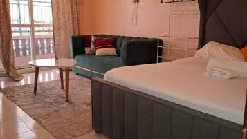 Superior Studio Suite, City View | Living area | Smart TV