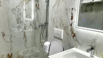Shower, free toiletries, hair dryer, soap