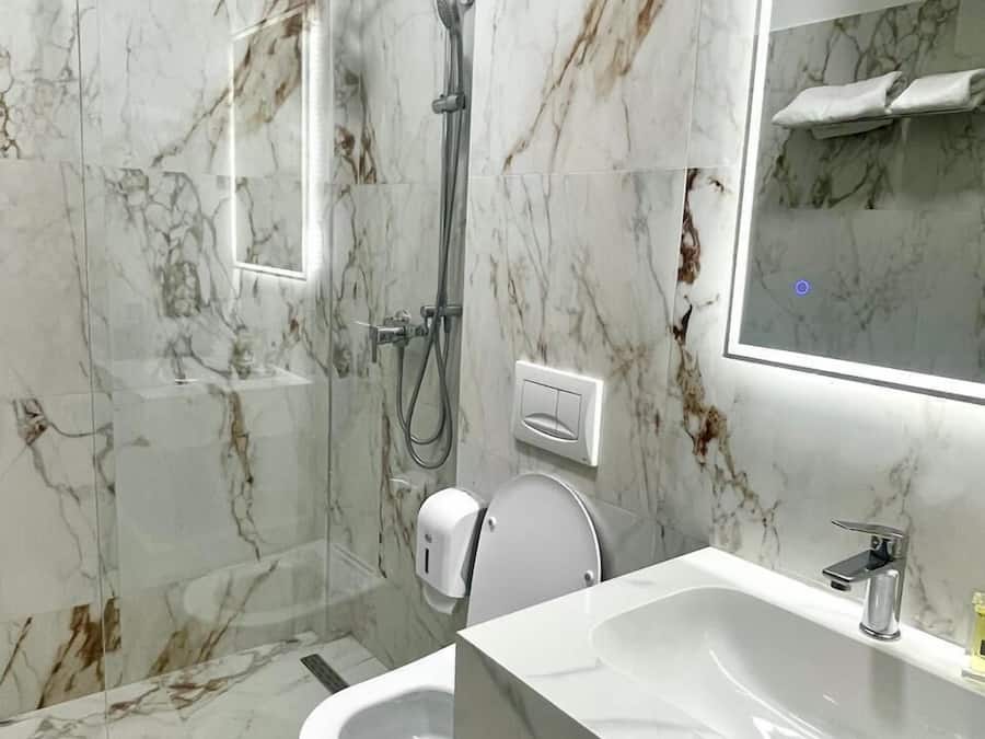 Shower, free toiletries, hair dryer, soap