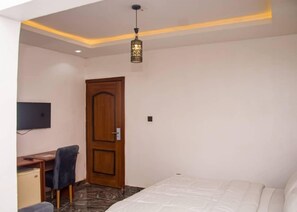 In-room safe, desk, laptop workspace, blackout curtains
