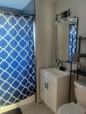 Hair dryer, towels, soap, toilet paper