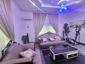 Family Apartment, Balcony, City View | Living area