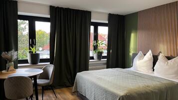 1 bedroom, desk, iron/ironing board, travel crib