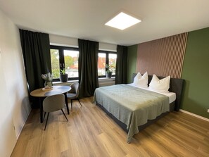 1 bedroom, desk, iron/ironing board, travel cot